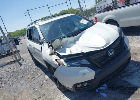 2019 Honda Passport Elite z USA, uszkodzony, nr VIN 5FNYF8H09KB015198